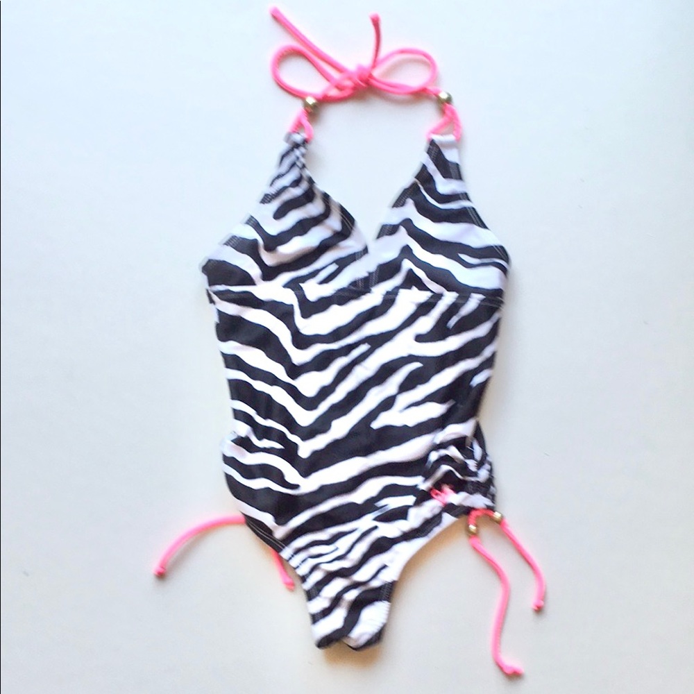 Sold on another site 
Justice swimsuit with gold beads size 7 good condition